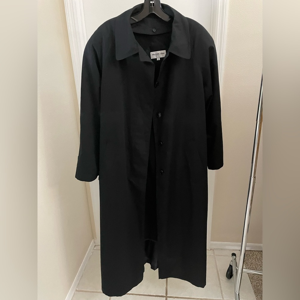 Women’s Long Black Jacket. Button front and lined. Size 10.